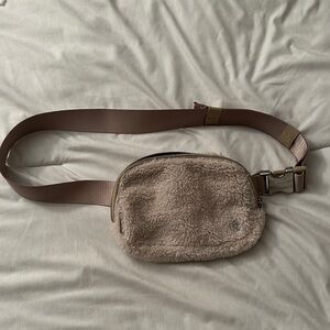 Barely used cream lululemon belt bag